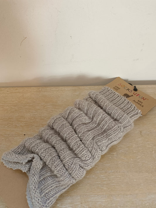 OTRAS. Calentadores grises claro