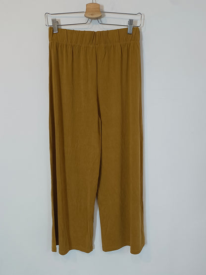 MANGO. Pantalón fluido mostaza T.s