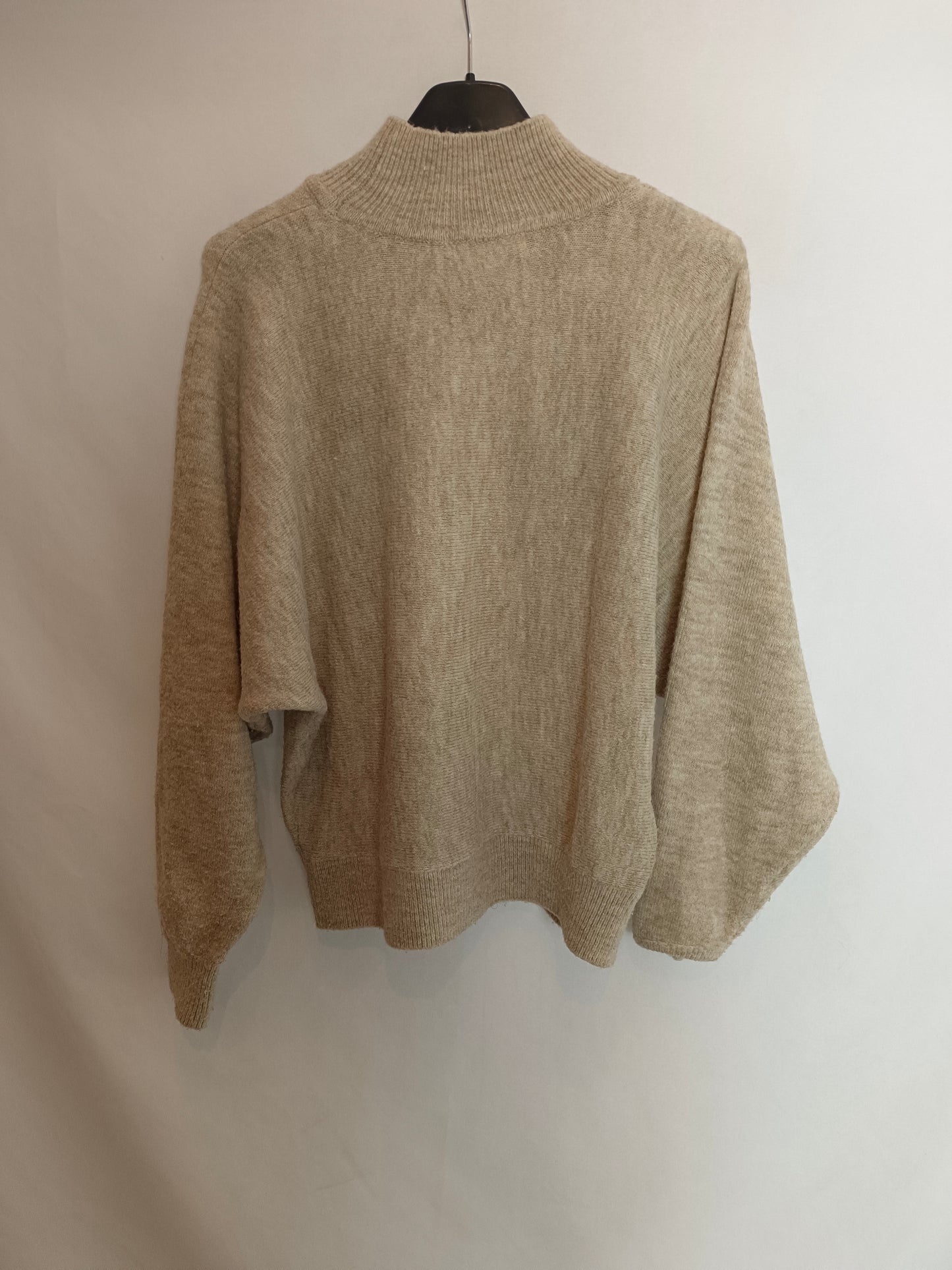 H&M.Jersey beige cuello perkins T.xs