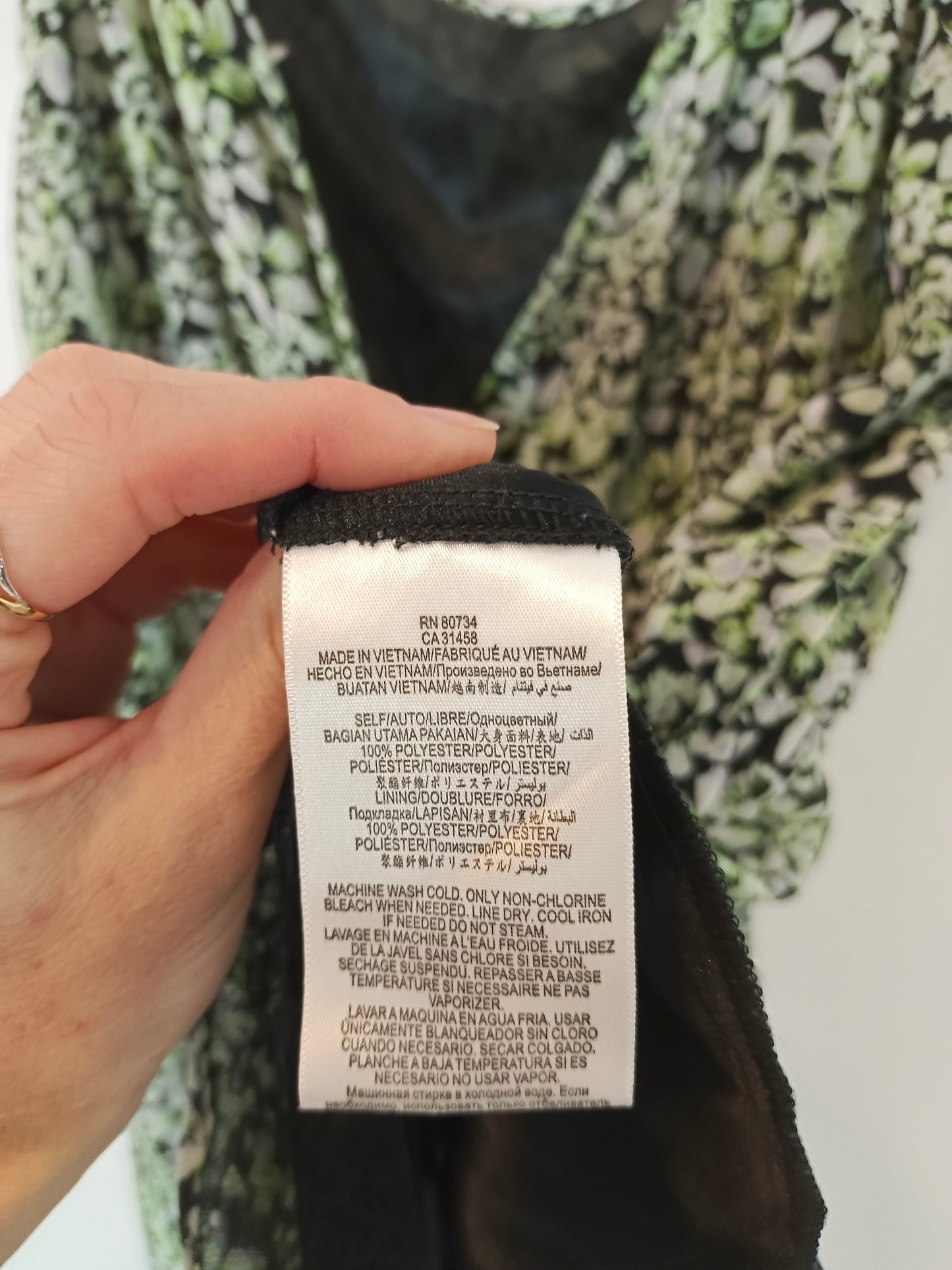 BCBG. Mono corto negro flores T.m