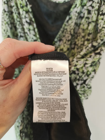 BCBG. Mono corto negro flores T.m