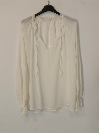MI&CO. Blusa blanca fluida T.xs