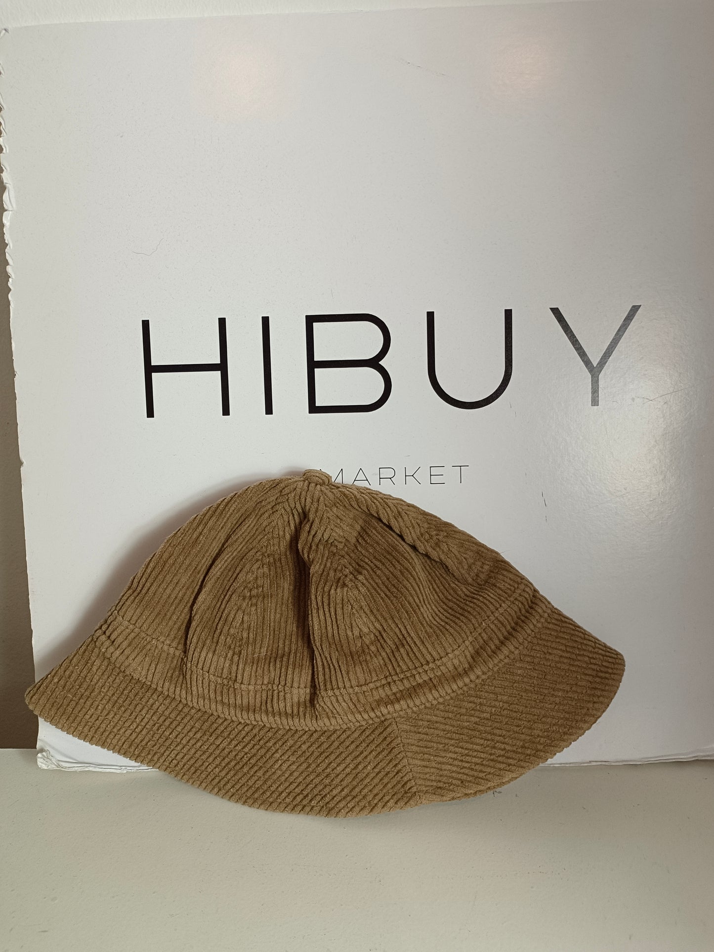 ESE O ESE. Bucket marrón pana