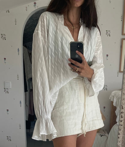 LÉANE STUDIO. White blouse with embroidered details. TS