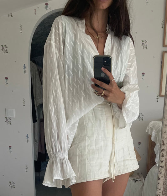 LÉANE STUDIO. White blouse with embroidered details. TS