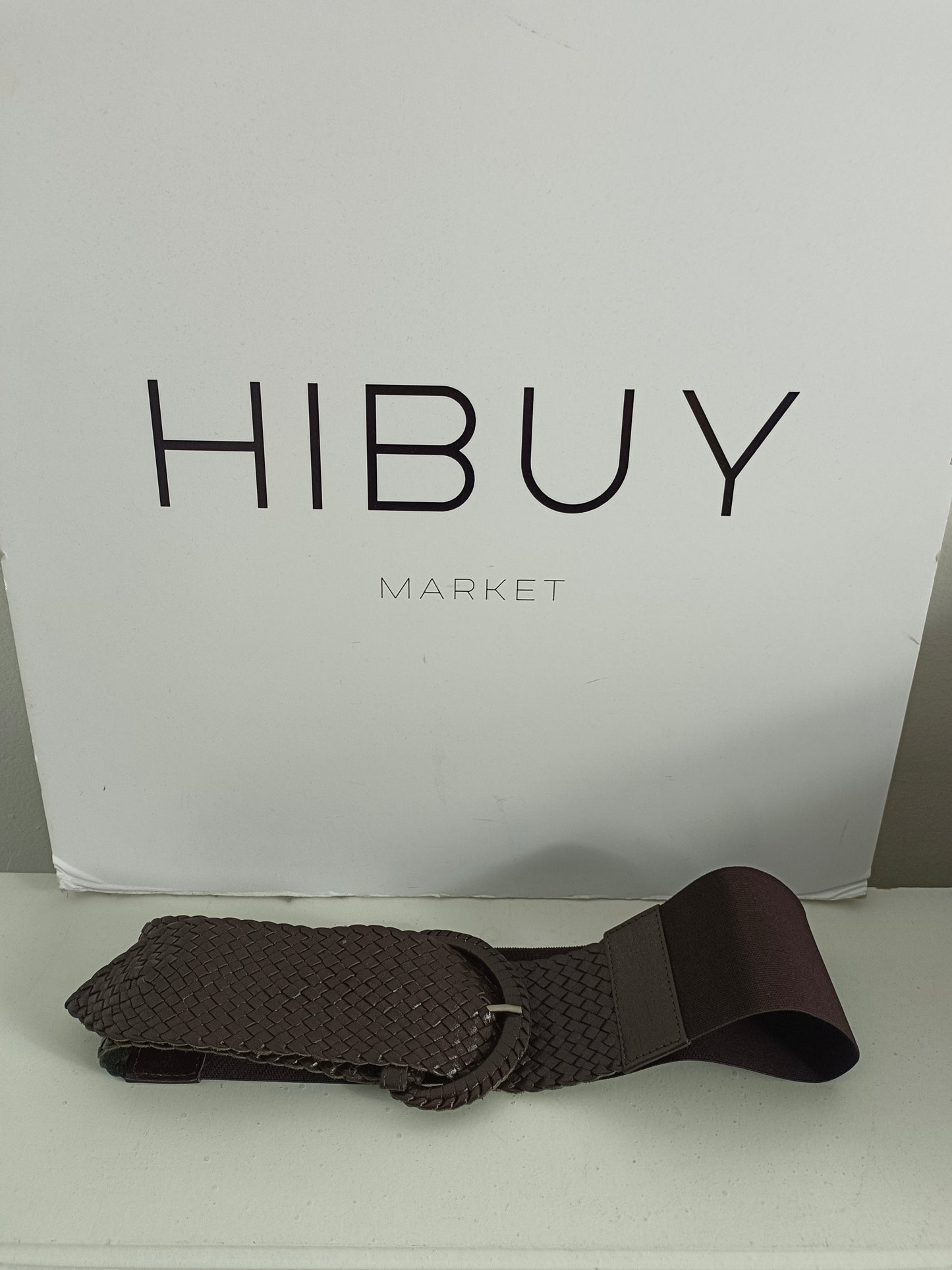 OTRAS. Cinturón marrón trenzado