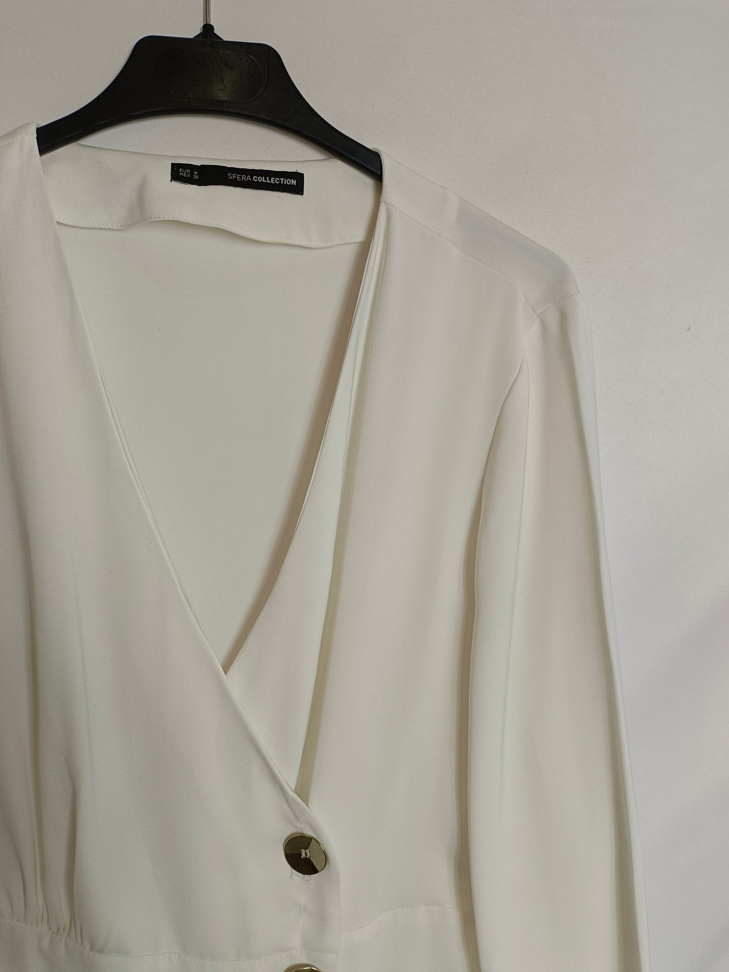 SFERA. Blusa blanca cruzada T.m