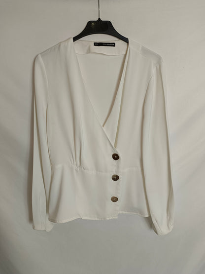 SFERA. Blusa blanca cruzada T.m