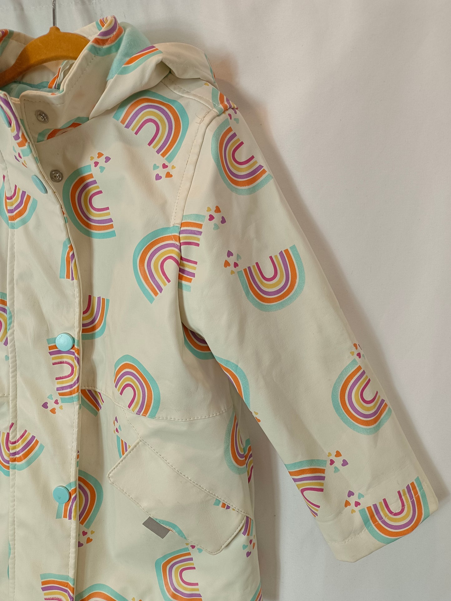 PRIMARK. chubasquero arcoíris T.2-3 años