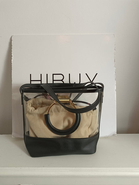 OTRAS. Bolso negro plástico transparente