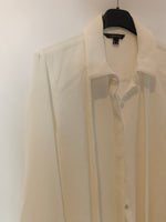 CORTEFIEL. Blusa blanca textura y lazada T.m