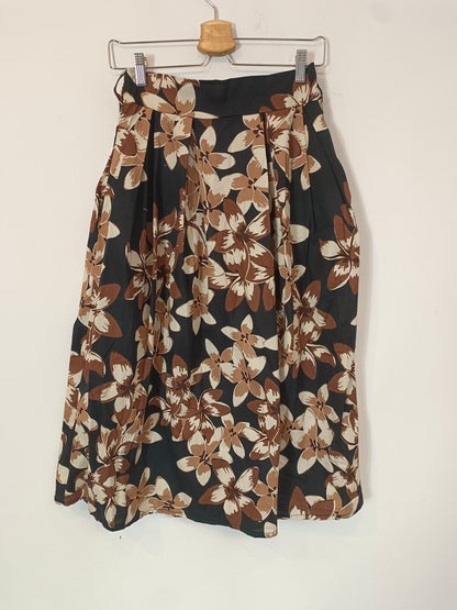 OTRAS. falda negra flores TU(S)