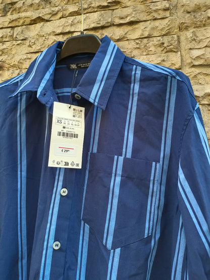 ZARA. Mono corto azul rayas T.xs