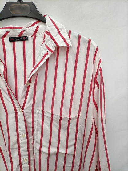 BERSHKA. Blusa rayas T.s