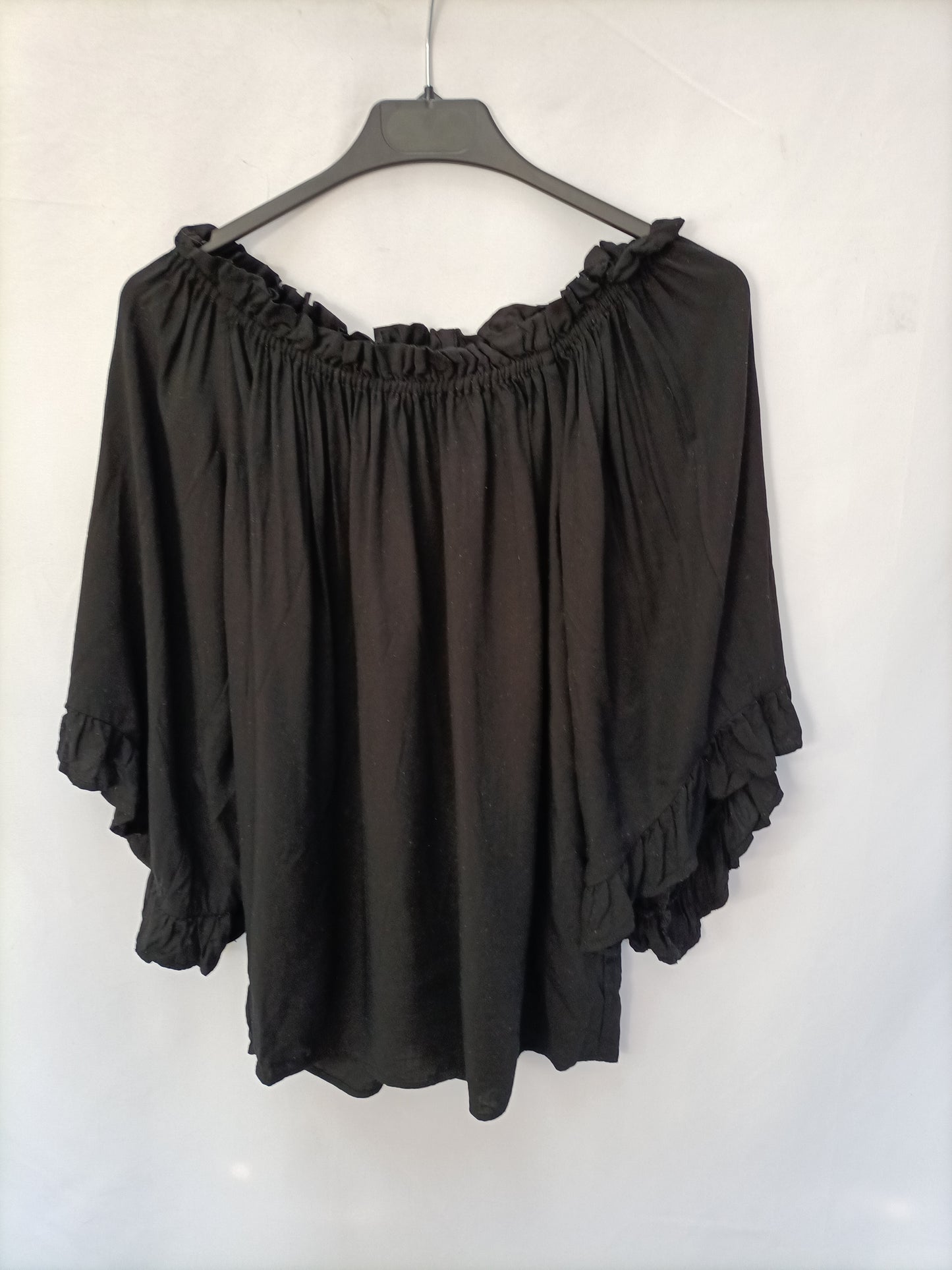 H&M. Top negro cuello barco T.34