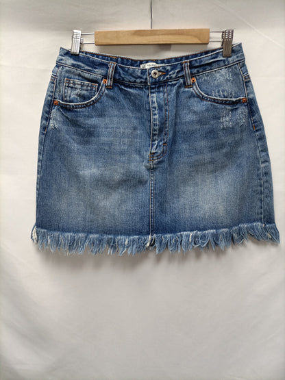PULL&BEAR. Falda denim flecos  T.L