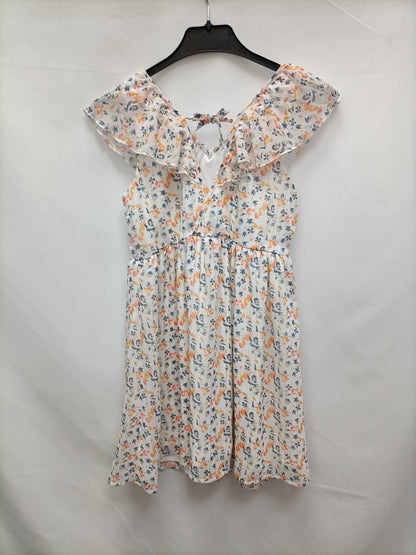 GEMO. Vestido blanco flores y rayas  T.10 años