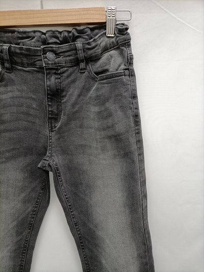 NUKUTAVAKE. Pantalones gris oscuro T.12