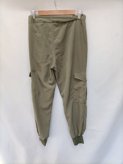 ZARA. Flowy green trousers T.xs