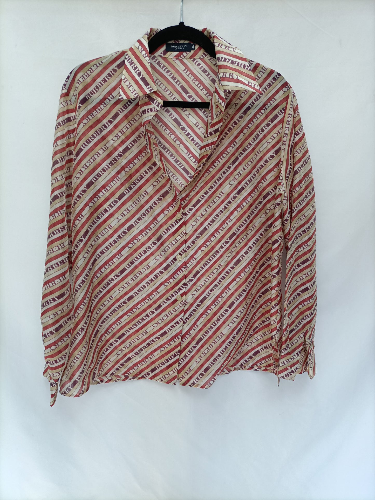 BURBERRY. Blusa  rayas semitransparente T.46