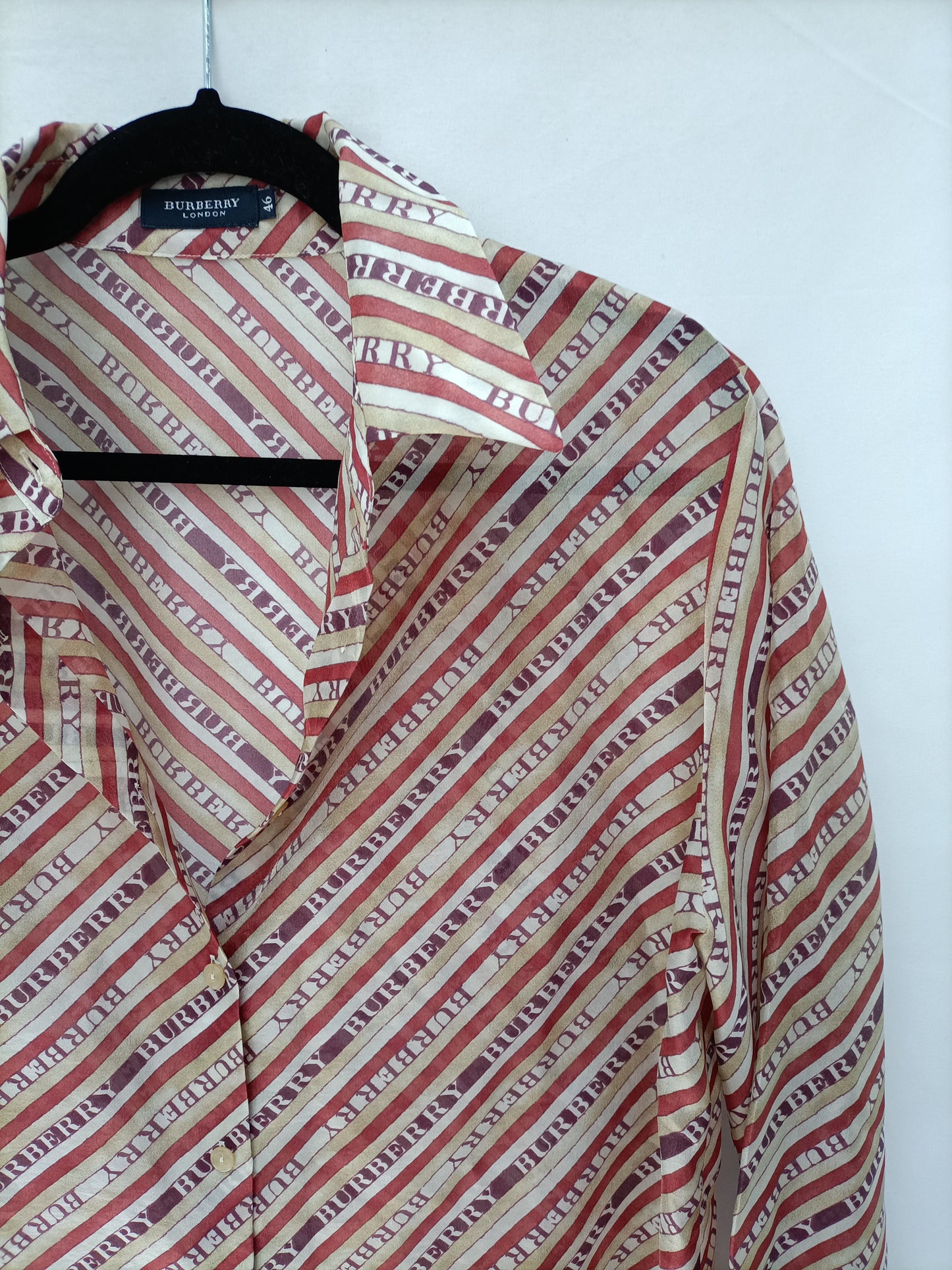 BURBERRY. Blusa  rayas semitransparente T.46