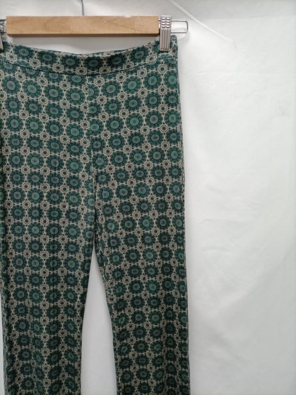 OTRAS. Pantalón de campana verdesT.u (s)