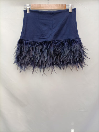 MAY&CO. Falda corta plumas T.s