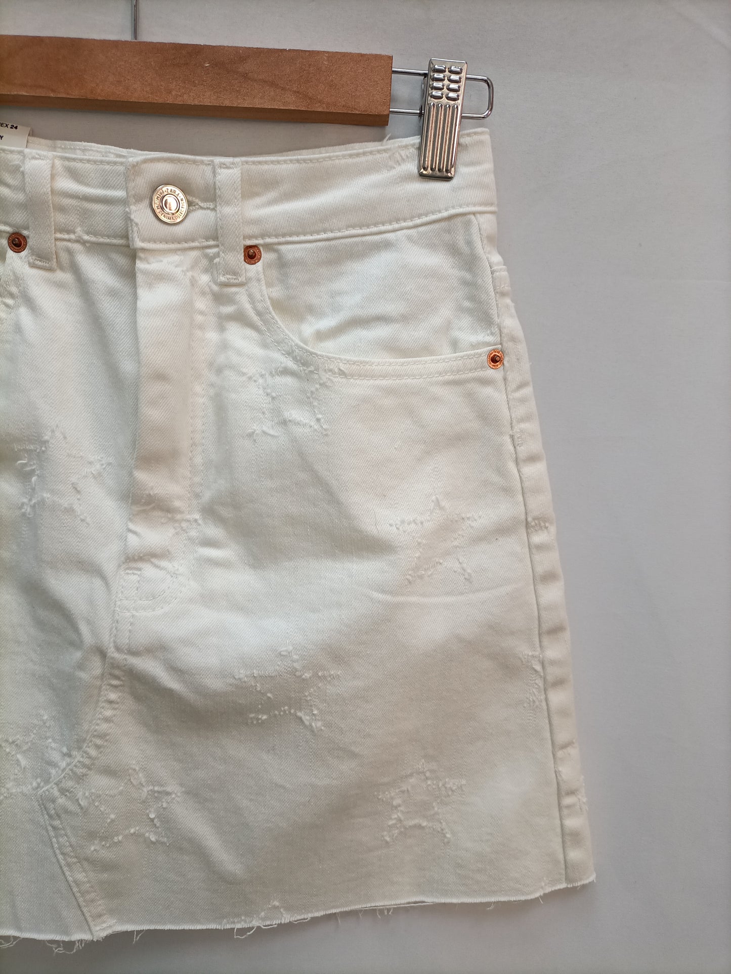 ZARA. Falda denim estrellas T.xs
