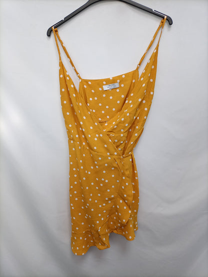 BERSHKA. Vestido lunares T.s