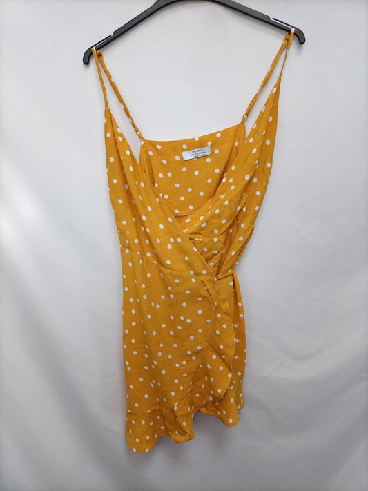 BERSHKA. Vestido lunares T.s