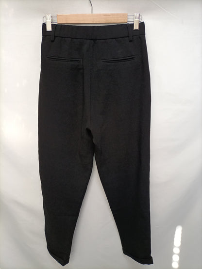 PULL& BEAR. Pantalón negro fluido T.s