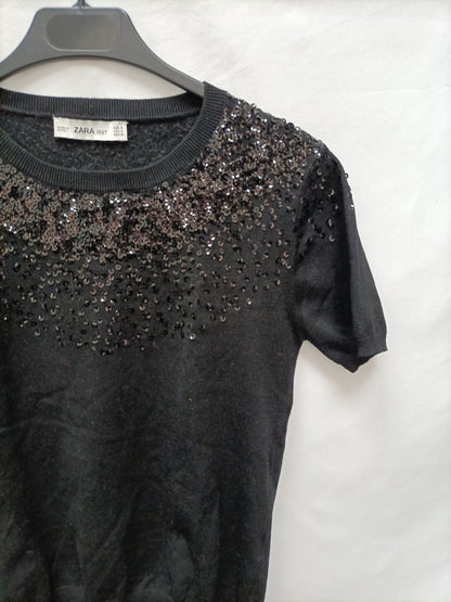 ZARA. Top negro lentejuelas T.s