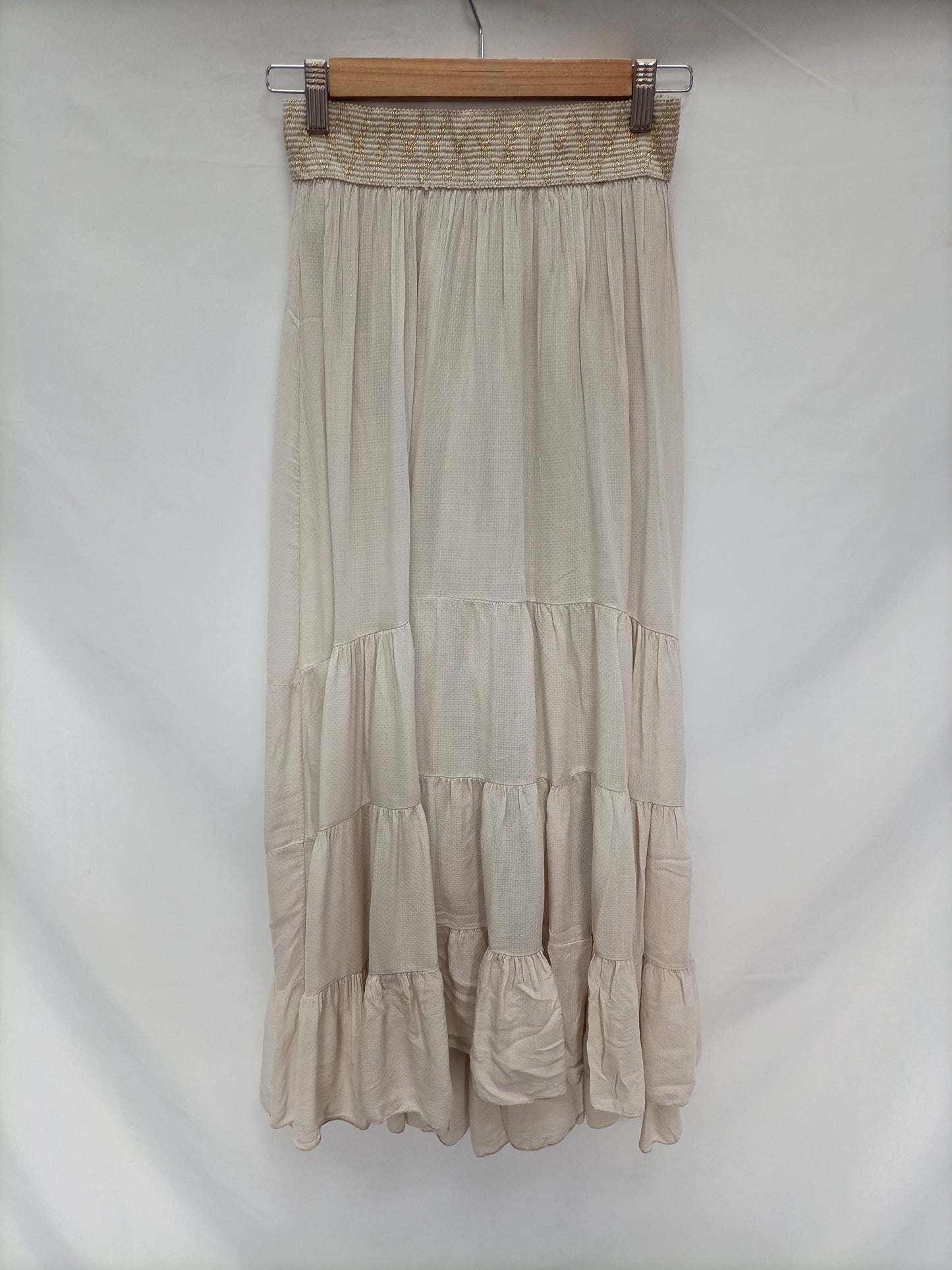 OTRAS. Falda beige largs T.u (s)