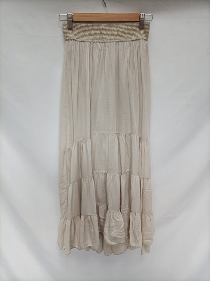 OTRAS. Falda beige largs T.u (s)