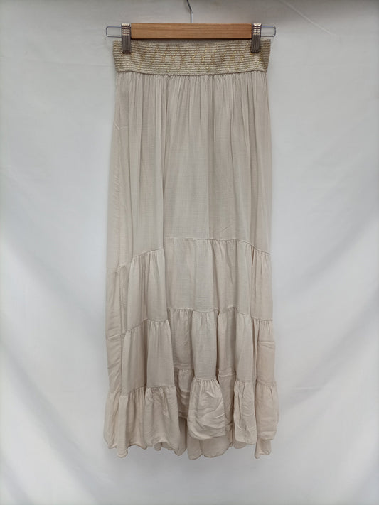 OTRAS. Falda beige largs T.u (s)