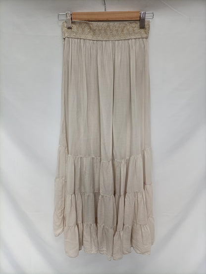 OTRAS. Falda beige largs T.u (s)