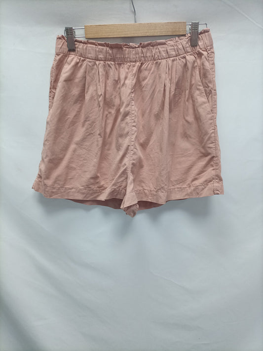 OYSHO. Shorts rosa palo fluido   T.36