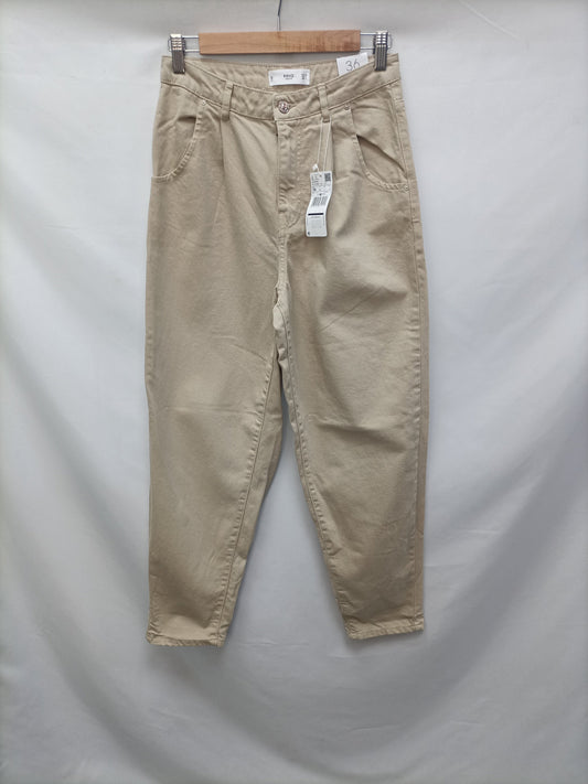 MANGO. Pantalón baggy beige T.36