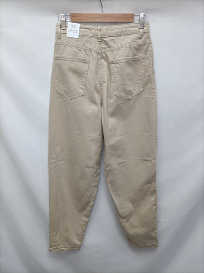 MANGO. Pantalón baggy beige T.36