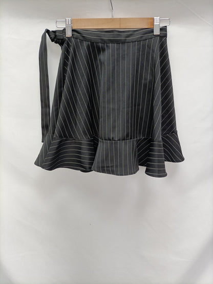 STOREST. Falda rayas volante T.32
