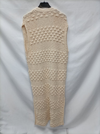 INTROPIA. Long beige vest Ts