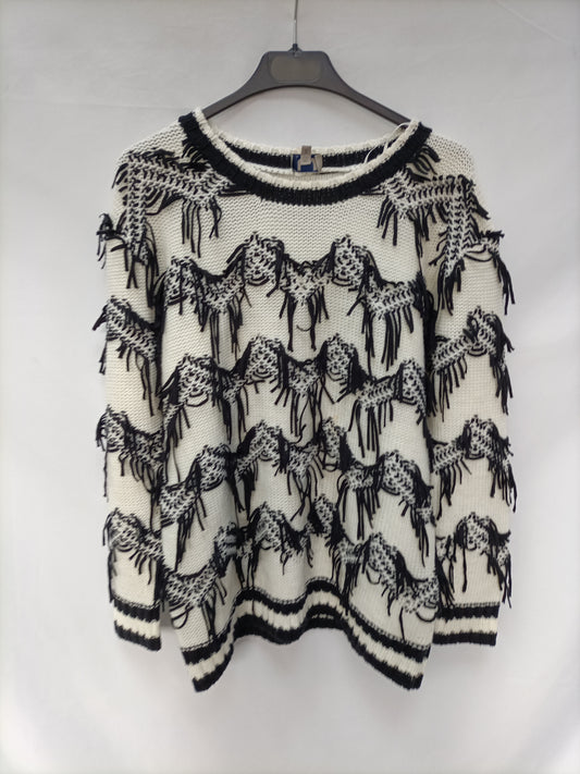 market.ADOLFO DOMÍNGUEZ. Beige fringed sweater Ts