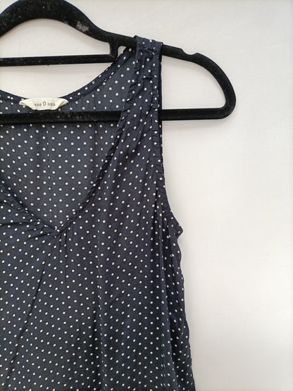 THAT ONE OR THAT ONE. Blue polka dot top T.xs