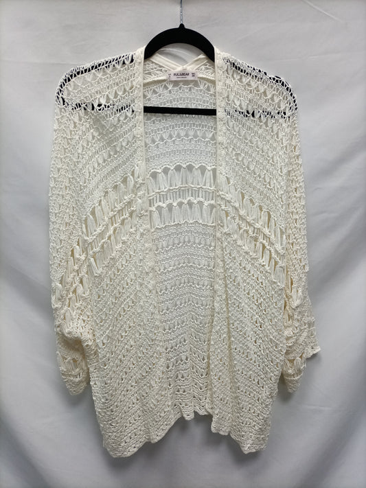 PULL&BEAR. Cárdigan beige troqueladol T.s