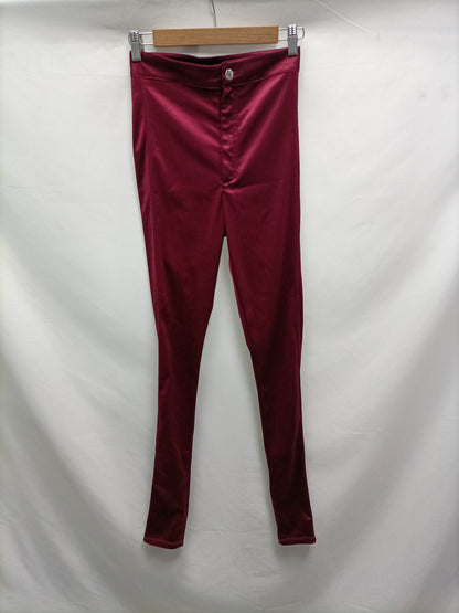 H&M. Leggins burdeos satinado T.s