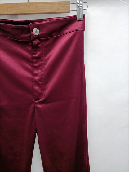 H&M. Leggins burdeos satinado T.s
