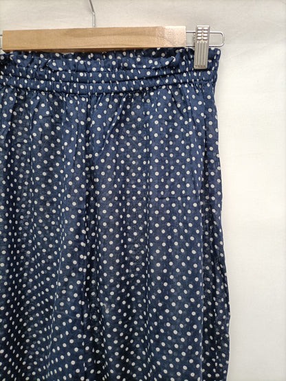 OYSHO. Pantalón fluido lunares T.m
