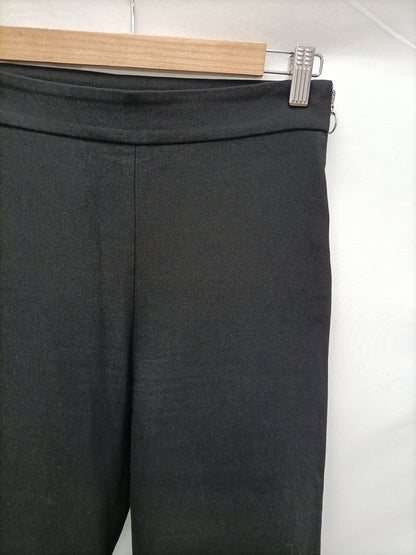 ZARA. Pantalón negro volantes T.xs
