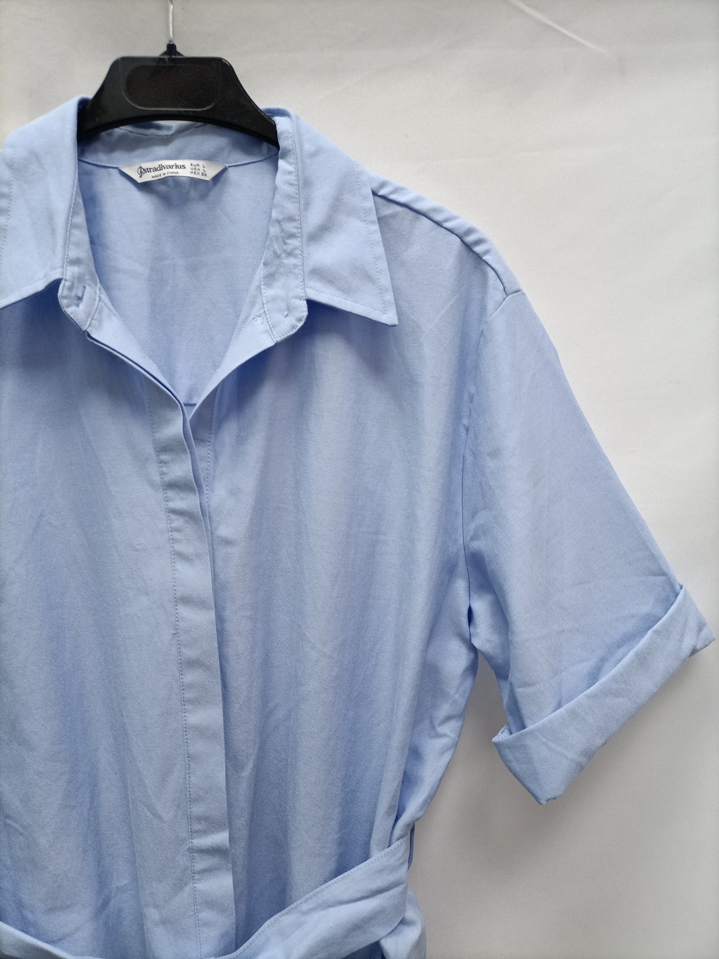 STRADIVARIUS. Blue bow Tl jumpsuit