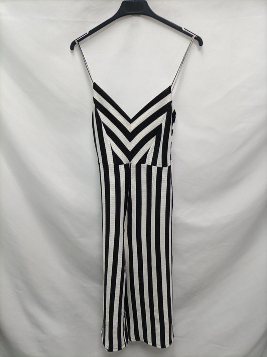 STRADIVARIUS. Black and white striped jumpsuit Ts